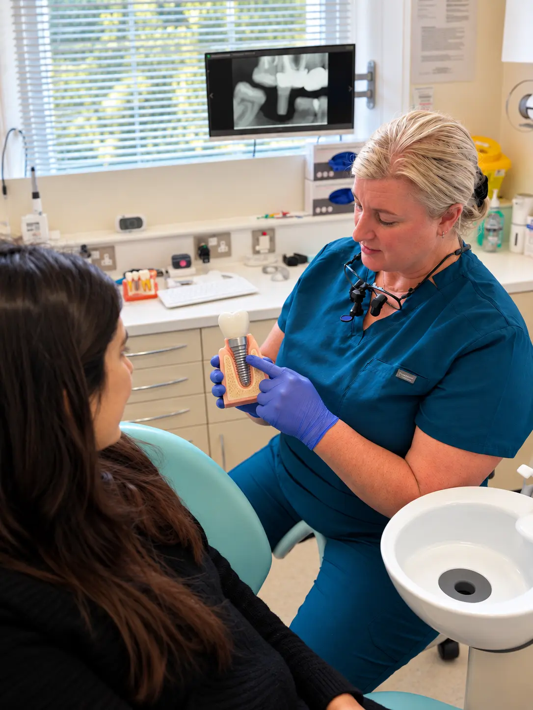 Dental Implant Consultation in a Bright Clinic