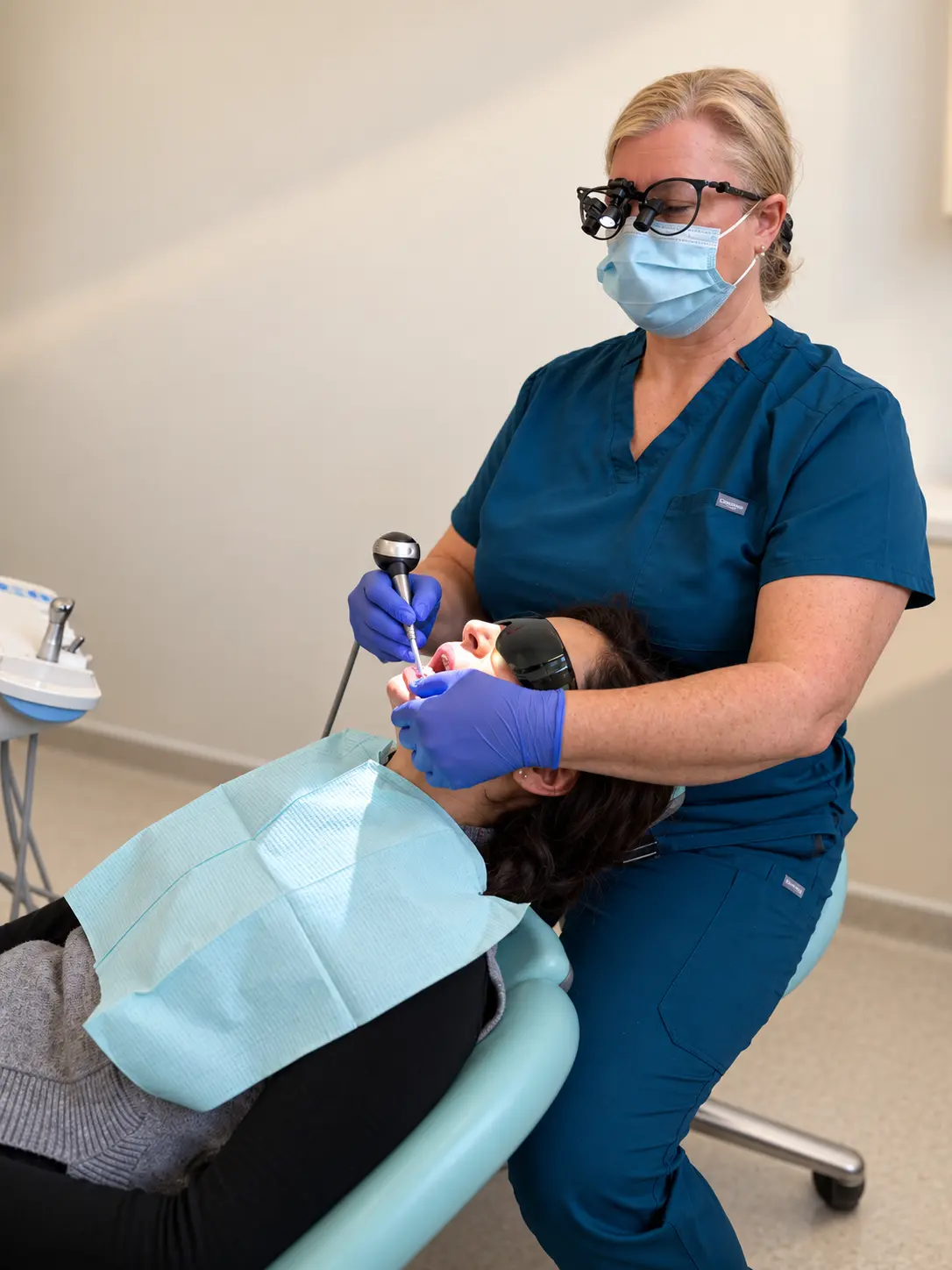 Dentist Providing Care in Modern Clinic